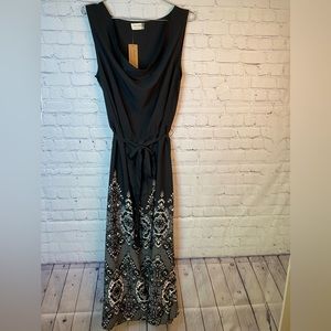 Peach Couture cowl neck Dress in black with beautiful design on bottom. Size Xl